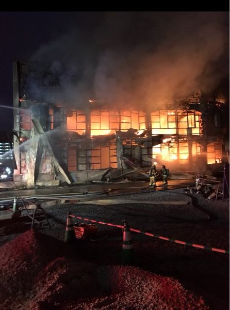 U.S. Navy Fire and Emergency Services Personnel Respond to Warehouse Fire