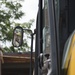 Staff Sgt. Daniel Arnold cleans up waste at the West Virginia Schools for the Deaf and the Blind