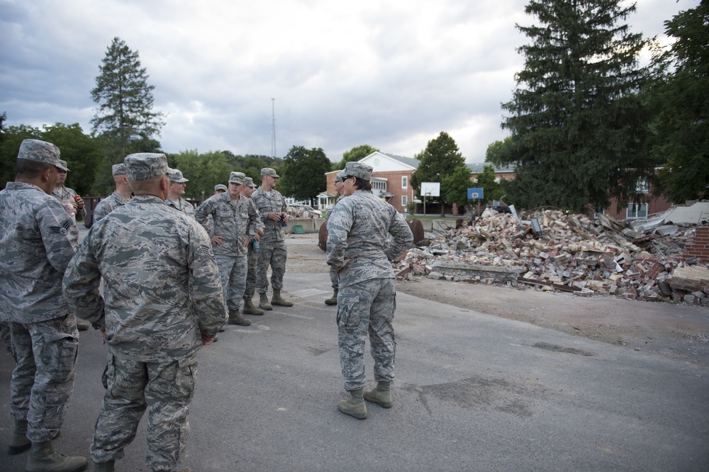 1st Lt. Amber S. Kenneda briefs Airmen at the West Virginia Schools for the Deaf and the Blind