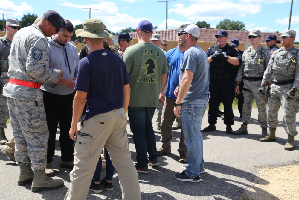 Air Force security forces, Wisconsin State Patrol trooper team up during Patriot North 2018