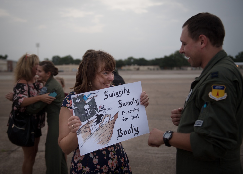 Airmen return home