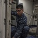 Sailor Aboard GHWB Cleans the Ship