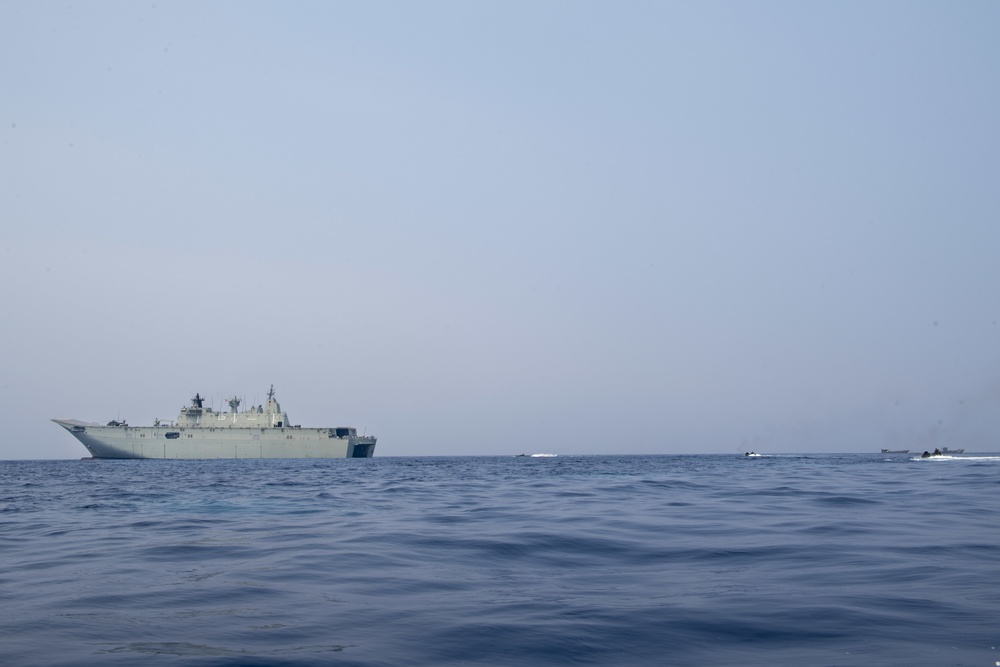 Assault amphibious vehicles board HMAS Adelaide during RIMPAC