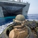 Assault amphibious vehicles board HMAS Adelaide during RIMPAC