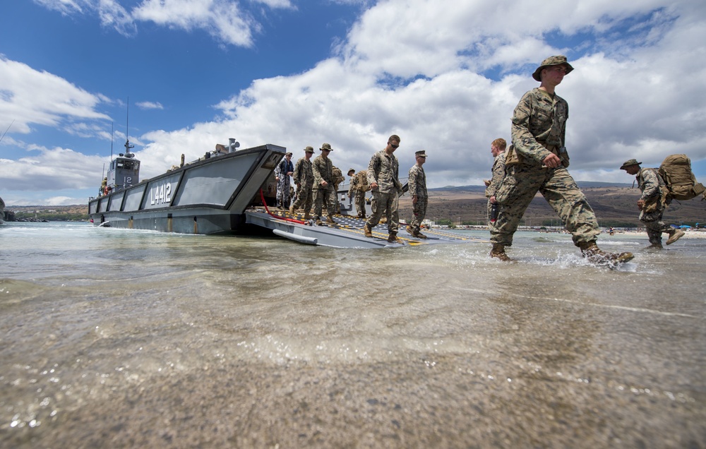 Landing Helicopter Dock Landing Craft Pick Up Troops Following Exercises At Pohakuloa Training Area During RIMPAC
