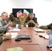 Members of the U.S. and Bulgarian Armed Forces discuss and plan future combined training exercises during a bilateral training conference