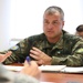 Members of the U.S. and Bulgarian Armed Forces discuss and plan future combined training exercises during a bilateral training conference