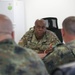 Members of the U.S. and Bulgarian Armed Forces discuss and plan future combined training exercises during a bilateral training conference.