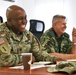 Members of the U.S. and Bulgarian Armed Forces discuss and plan future combined training exercises during a bilateral training conference.