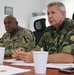 Members of the U.S. and Bulgarian Armed Forces discuss and plan future combined training exercises during a bilateral training conference.