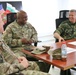 Members of the U.S. and Bulgarian Armed Forces discuss and plan future combined training exercises during a bilateral training conference.