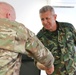 Members of the U.S. and Bulgarian Armed Forces discuss and plan future combined training exercises during a bilateral training conference.