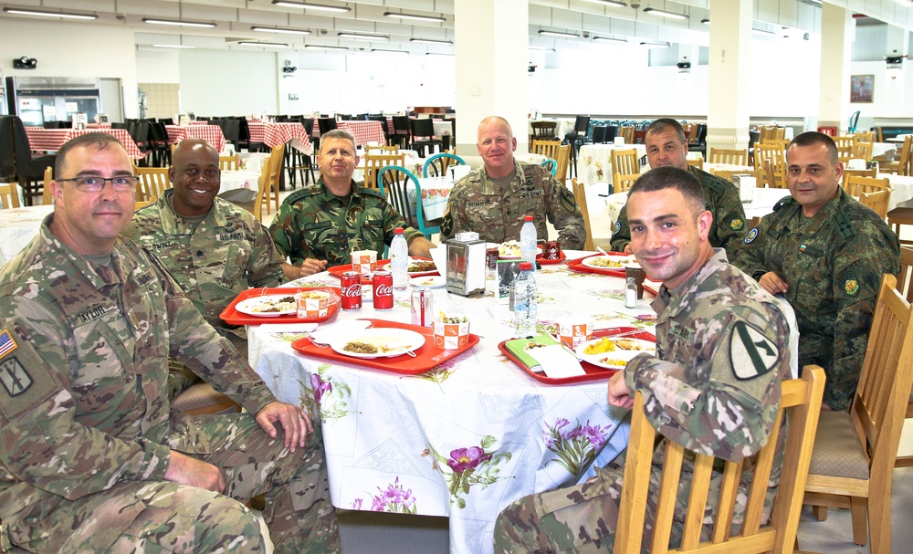 Members of the U.S. and Bulgarian Armed Forces discuss and plan future combined training exercises during a bilateral training conference.