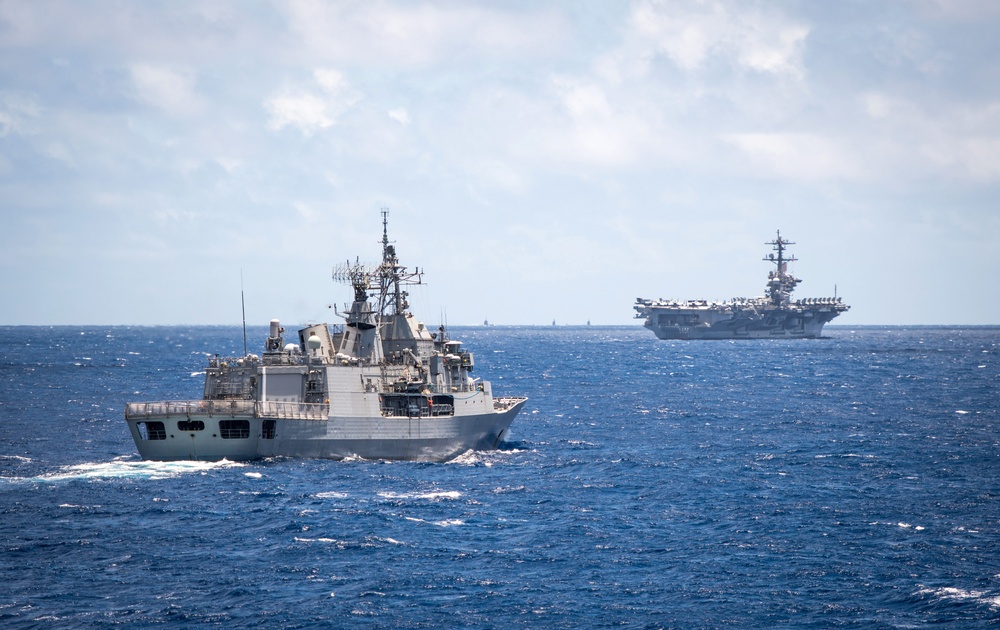 HMNZS Te Mana and USS Carl Vinson sail during RIMPAC 2018 photo exercise