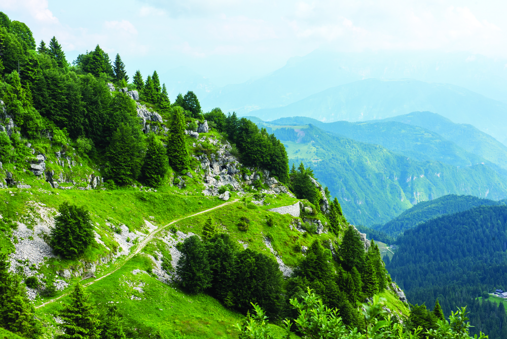 NCOs traverse mountaintop in steps of WWI Soldiers