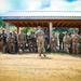 Army Col. Wilson Rutherford speaks to his troops in the field