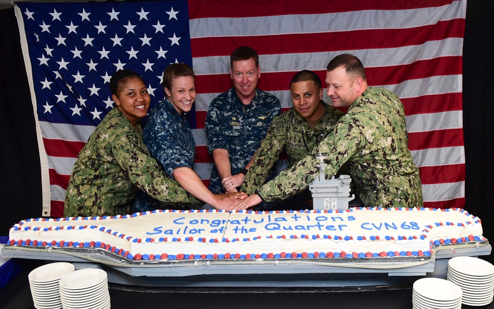 Commanding Officer Cuts Award Cake