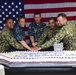 Commanding Officer Cuts Award Cake