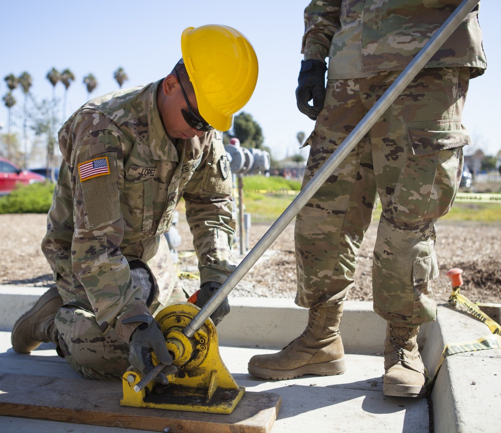315th Vertical Construction Company builds sidewalks at JFTB