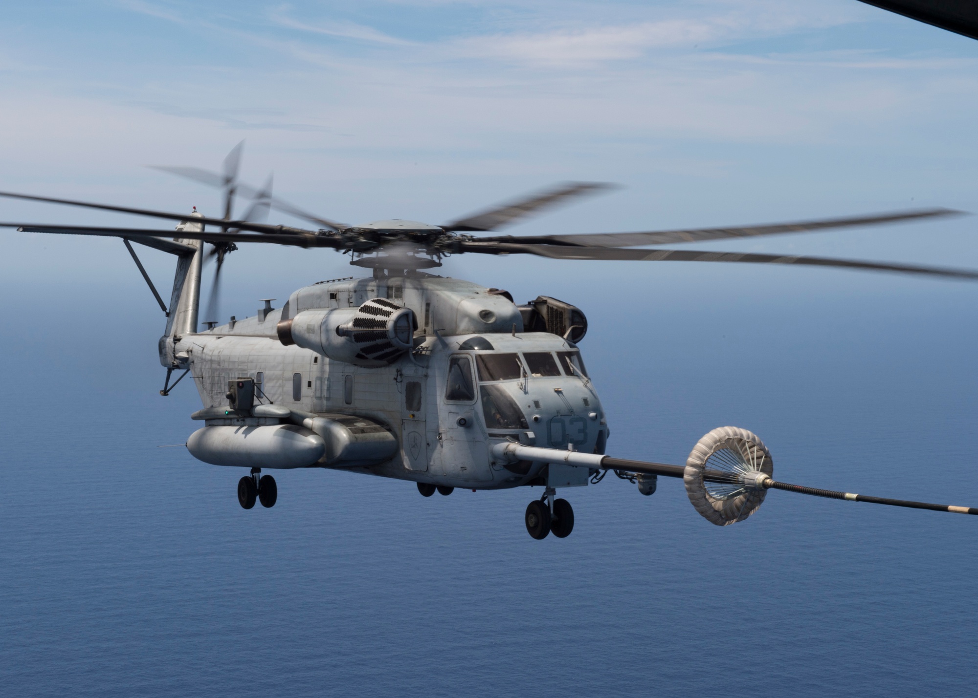 DVIDS - Images - Marine C-130 refuels CH-53 mid-flight during