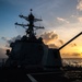 USS Dewey sails at sunset during RIMPAC 2018