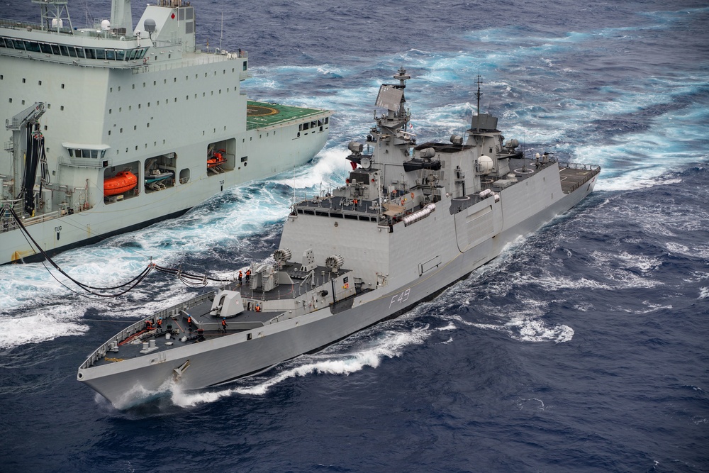 Chilean, Indian, and Royal Canadian navies resupply at sea during RIMPAC
