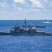USS Lake Champlain sails with partner nations during RIMPAC