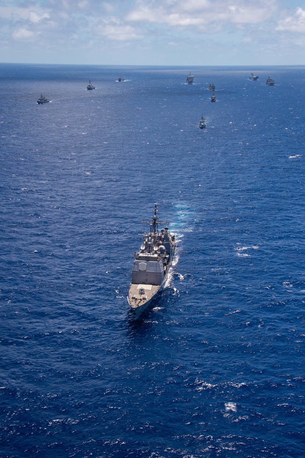 USS Lake Champlain sails with partner nations during RIMPAC