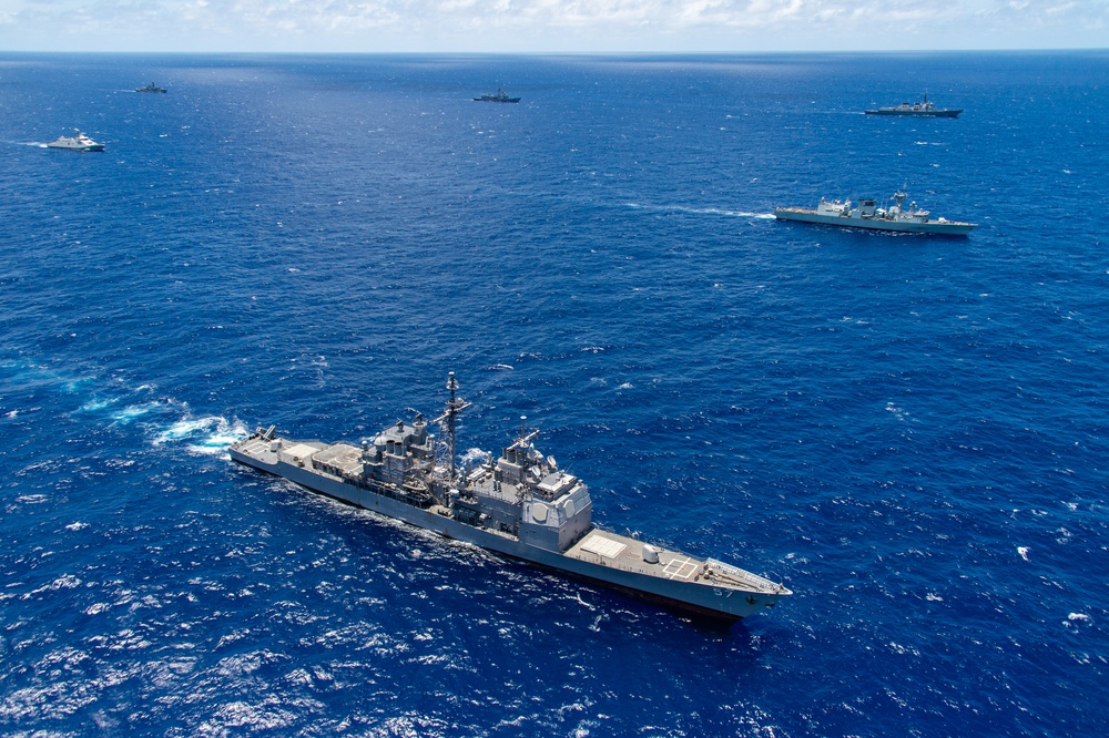 USS Lake Champlain sails with partner nations during RIMPAC