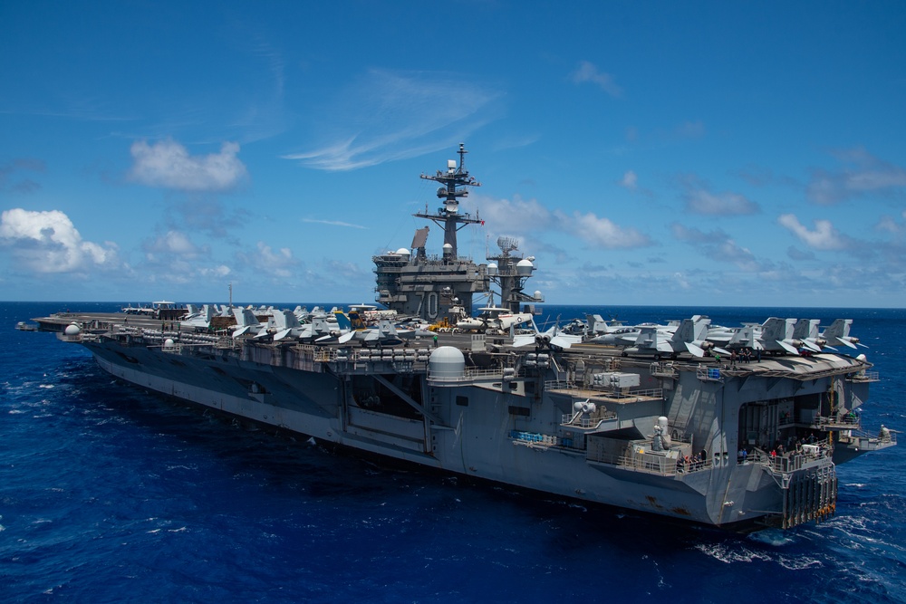 USS Carl Vinson sails with partner nations during RIMPAC