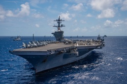 USS Carl Vinson sails with partner nations during RIMPAC