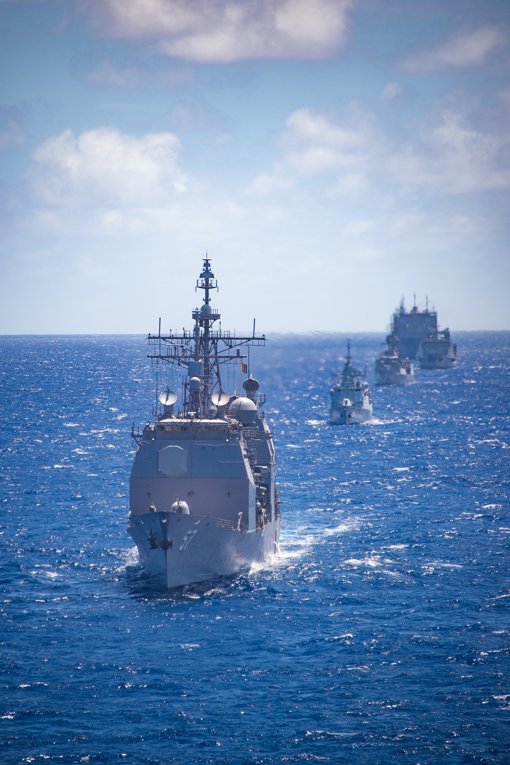 USS Lake Champlain sails with partner nations during RIMPAC