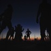Sailors aboard the USS Mount Whitney (LCC 20) conduct a sunrise physical training session in the Mediterrranean Sea.