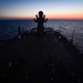 Sailors aboard the USS Mount Whitney (LCC 20) conduct a sunrise physical training session in the Mediterrranean Sea.