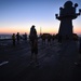 Sailors aboard the USS Mount Whitney (LCC 20) conduct a sunrise physical training session in the Mediterrranean Sea.