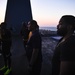 Sailors aboard the USS Mount Whitney (LCC 20) conduct a sunrise physical training session in the Mediterrranean Sea.