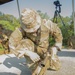 Charlie Company, 100th Infantry Regiment, storms the objective on a live fire range