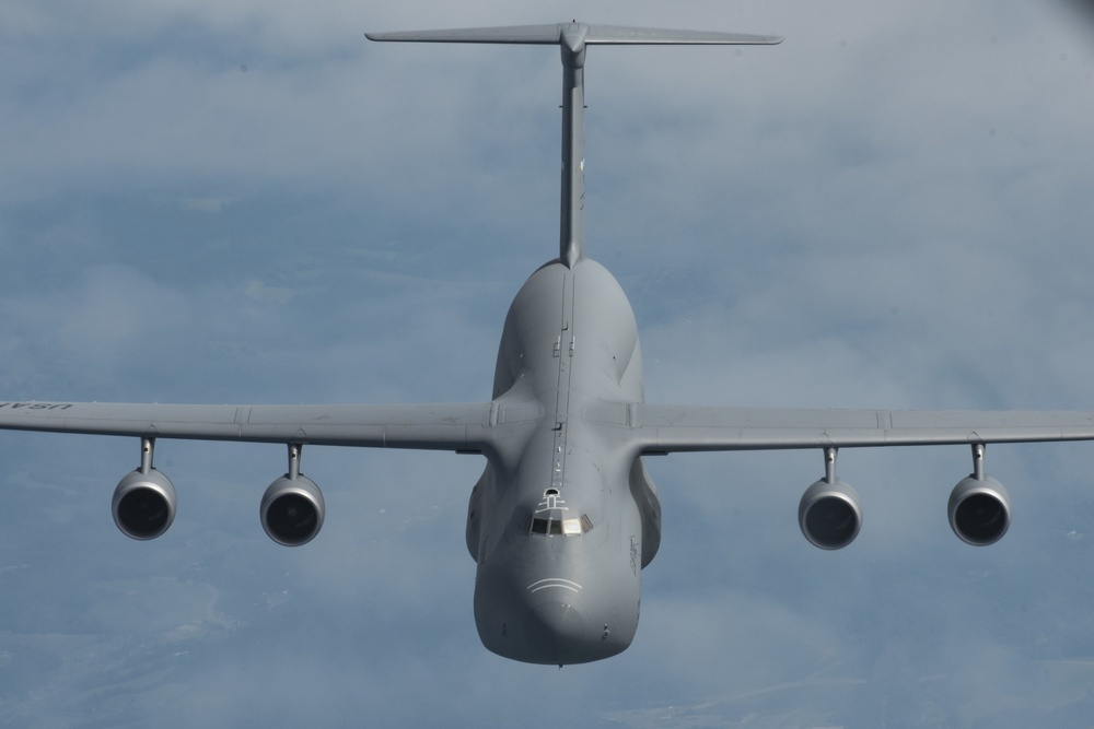 121st ARW KC-135 Stratotanker refuels Dover AFB C-5 Galaxy