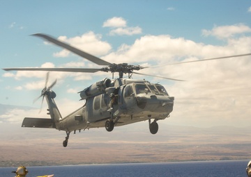 U.S. Navy transport Australian Sailors to PTA