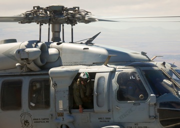 U.S. Navy transport Australian Sailors to PTA