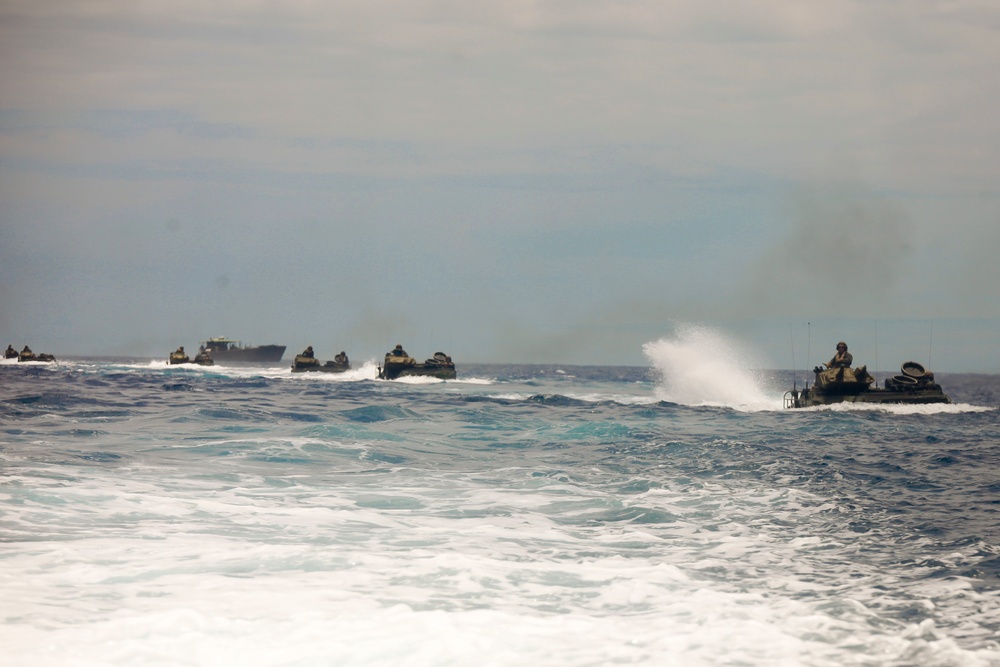 U.S. Marines return to HMAS Adelaide during RIMPAC