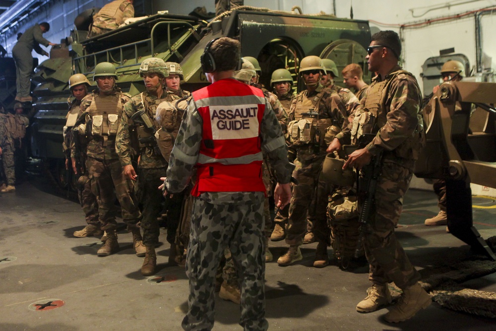 Tonga, U.S. Marines return to HMAS Adelaide during RIMPAC