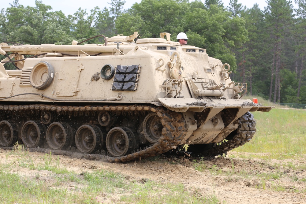 Students build skills in tracked vehicle recovery during RTS-Maintenance course at Fort McCoy