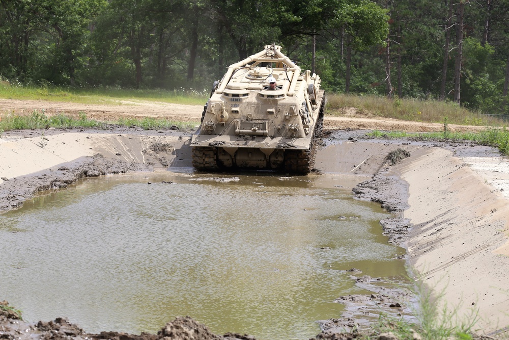 Students build skills in tracked vehicle recovery during RTS-Maintenance course at Fort McCoy