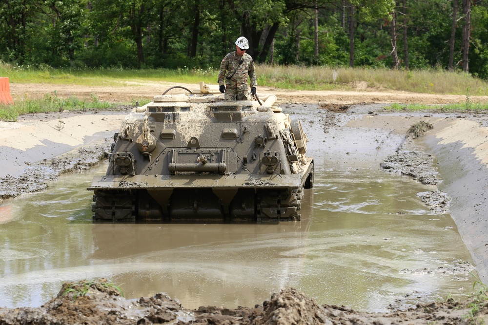 Students build skills in tracked vehicle recovery during RTS-Maintenance course at Fort McCoy