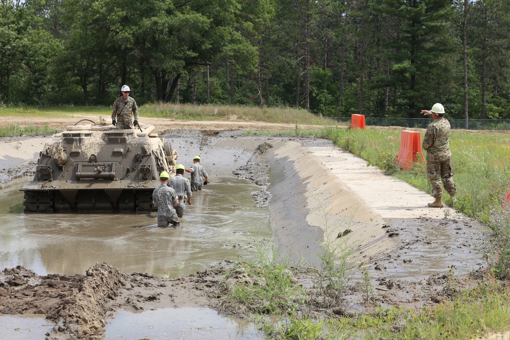 Students build skills in tracked vehicle recovery during RTS-Maintenance course at Fort McCoy