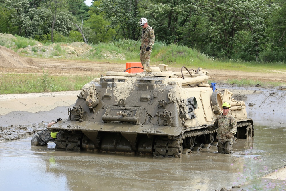 Students build skills in tracked vehicle recovery during RTS-Maintenance course at Fort McCoy