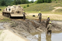 Students build skills in tracked vehicle recovery during RTS-Maintenance course at Fort McCoy