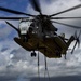 CH-53 transports howitzer during RIMPAC amphib landing demo