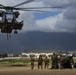 CH-53 transports howitzer during RIMPAC amphib landing demo